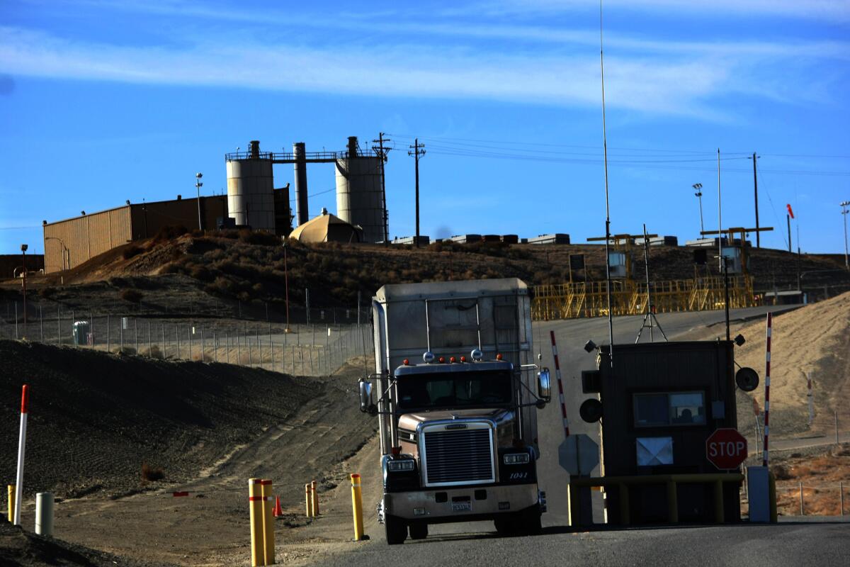 After dumping a load of toxic waste, a truck exits Chemical Waste Management in Kettleman City. Fifty-eight shipments destined for the landfill never arrived.