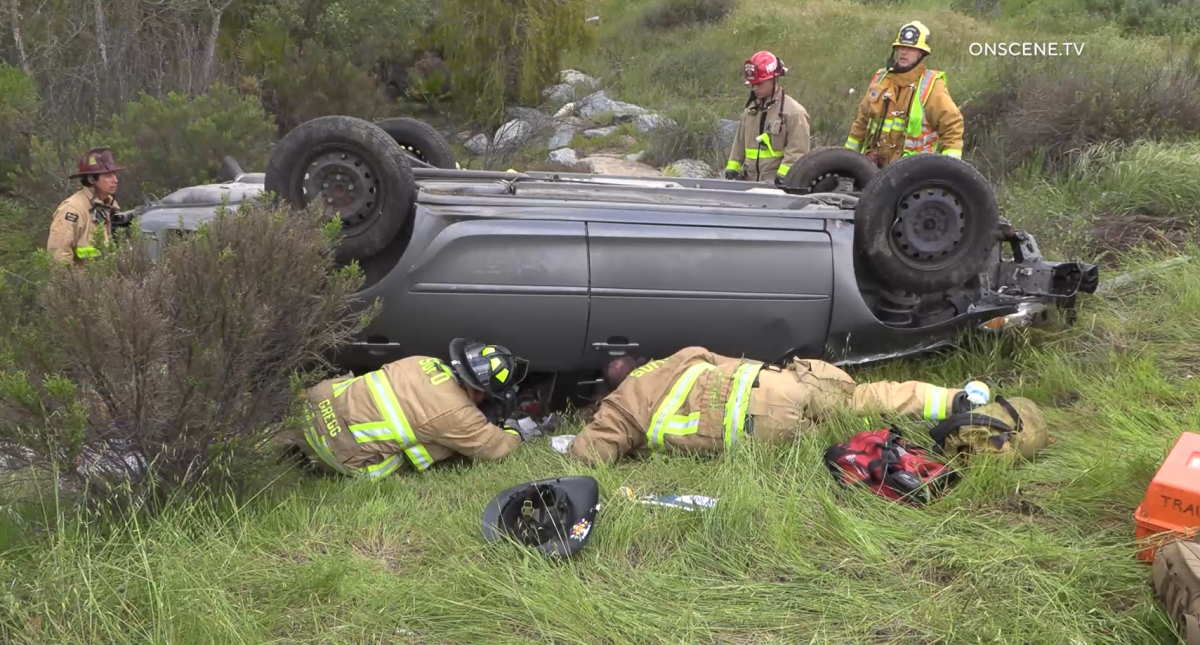 Driver dies in Mission Point rollover crash, van hits parked cars