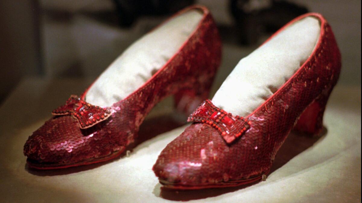 One of the four pairs of ruby slippers worn by Judy Garland in the 1939 film "The Wizard of Oz" on display during a media tour of the "America's Smithsonian" traveling exhibition in Kansas City, Mo., in 1996.