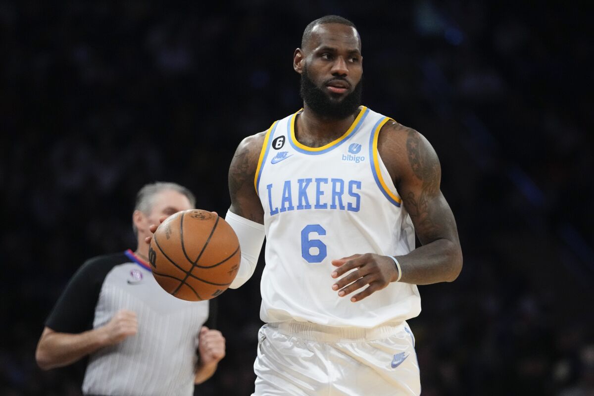 Los Angeles Lakers' LeBron James (6) looks to pass during the second half of an NBA basketball game against the New York Knicks Tuesday, Jan. 31, 2023, in New York. The Lakers won 129-123 in overtime. (AP Photo/Frank Franklin II)