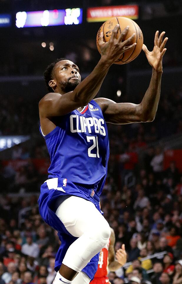 Clippers guard Patrick Beverley goes up for an uncontested layup.