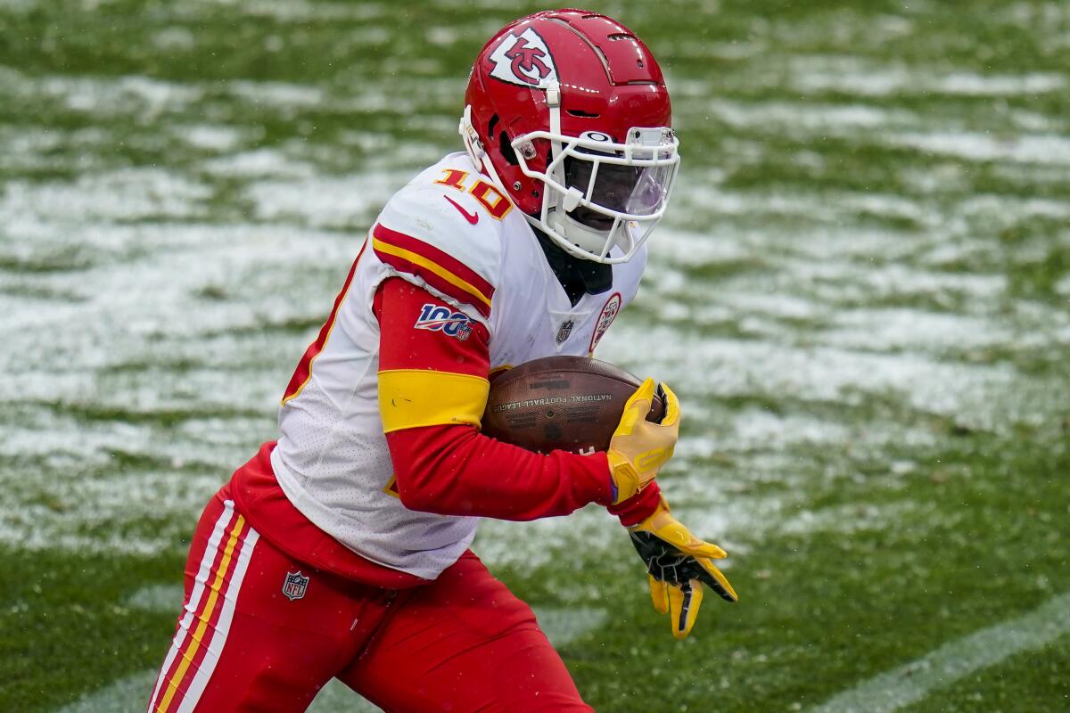Kansas City Chiefs wide receiver Tyreek Hill runs for a touchdown against the Denver Broncos.