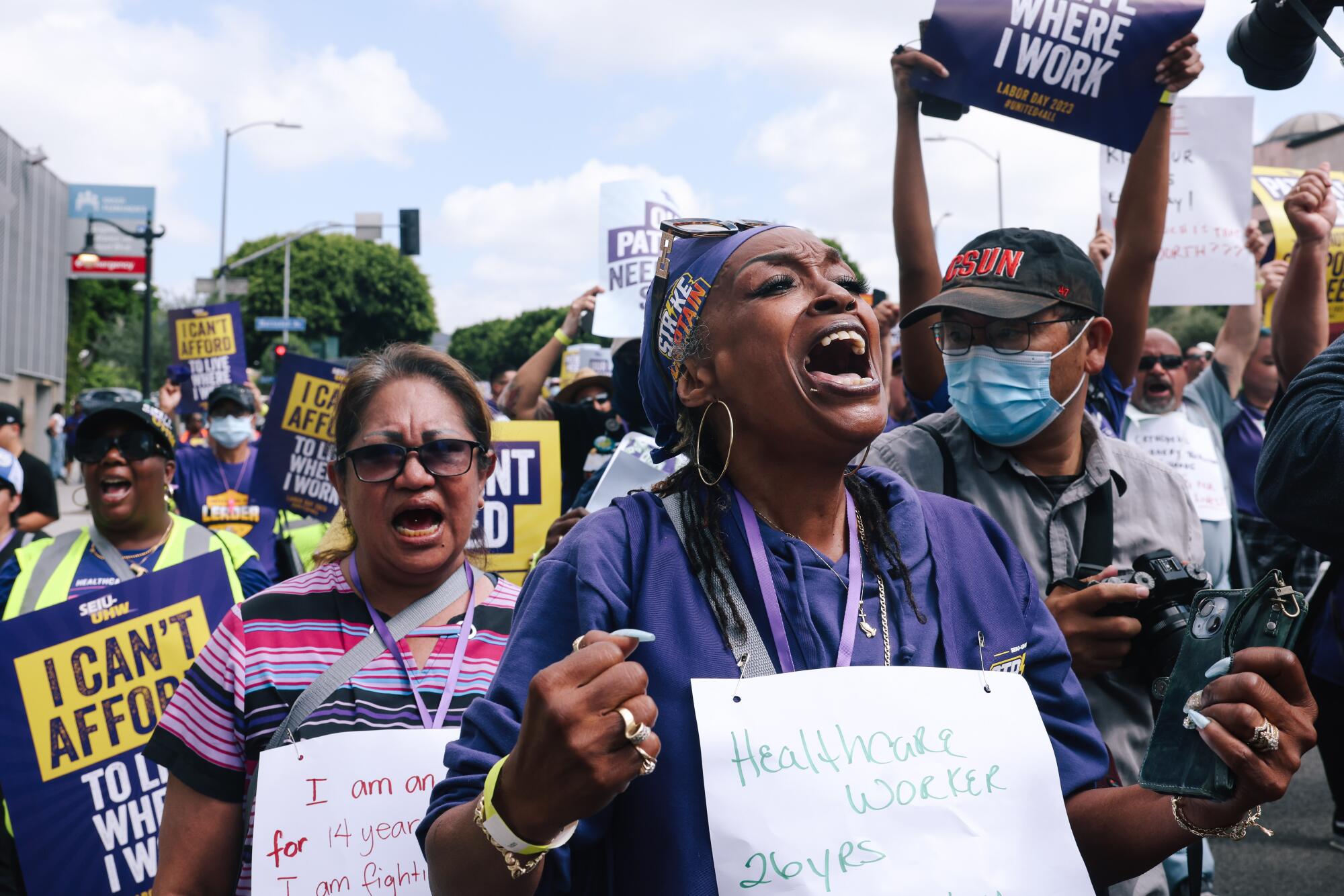 Healthcare workers march for improved working conditions and increased investment in the healthcare workforce.