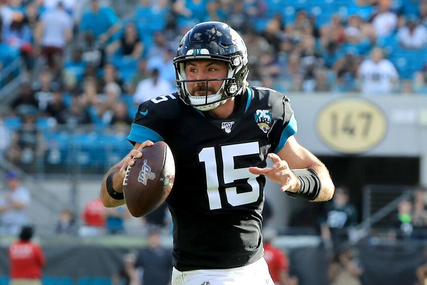 JACKSONVILLE, FLORIDA - DECEMBER 01: Gardner Minshew #15 of the Jacksonville Jaguars scrambles for yardage during the game against the Tampa Bay Buccaneers at TIAA Bank Field on December 01, 2019 in Jacksonville, Florida. (Photo by Sam Greenwood/Getty Images)