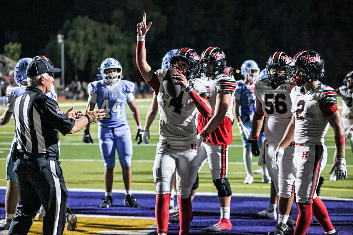 Matix Frithsmith celebrates after his third touchdown run in Hart High's 34-17 win over Saugus.