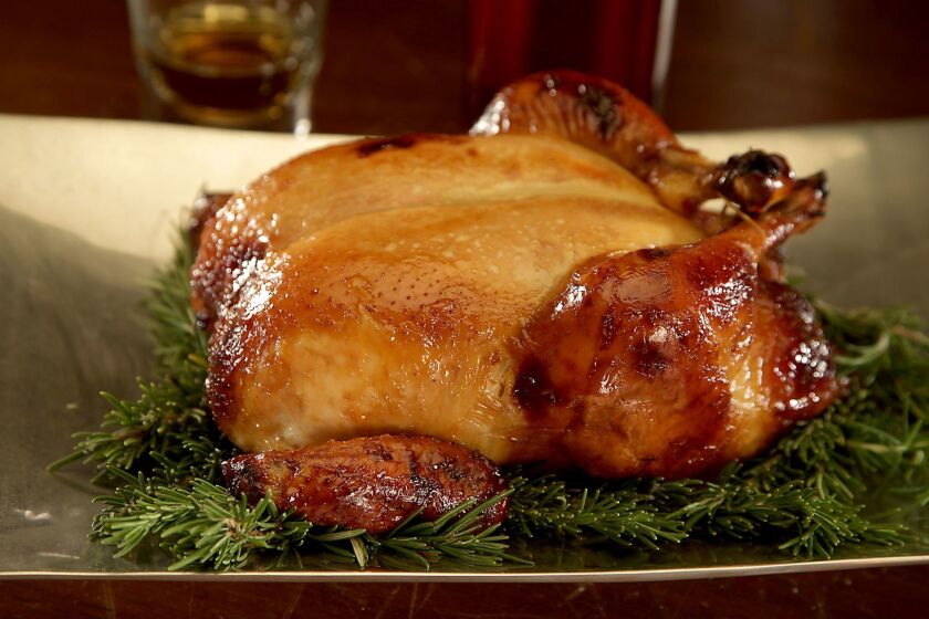 LOS ANGELES, CA., JANUARY 25, 2018-- Honey-Bourbon Roast Chicken: Cooking with Hard Alcohol (Kirk McKoy / Los Angeles Times)