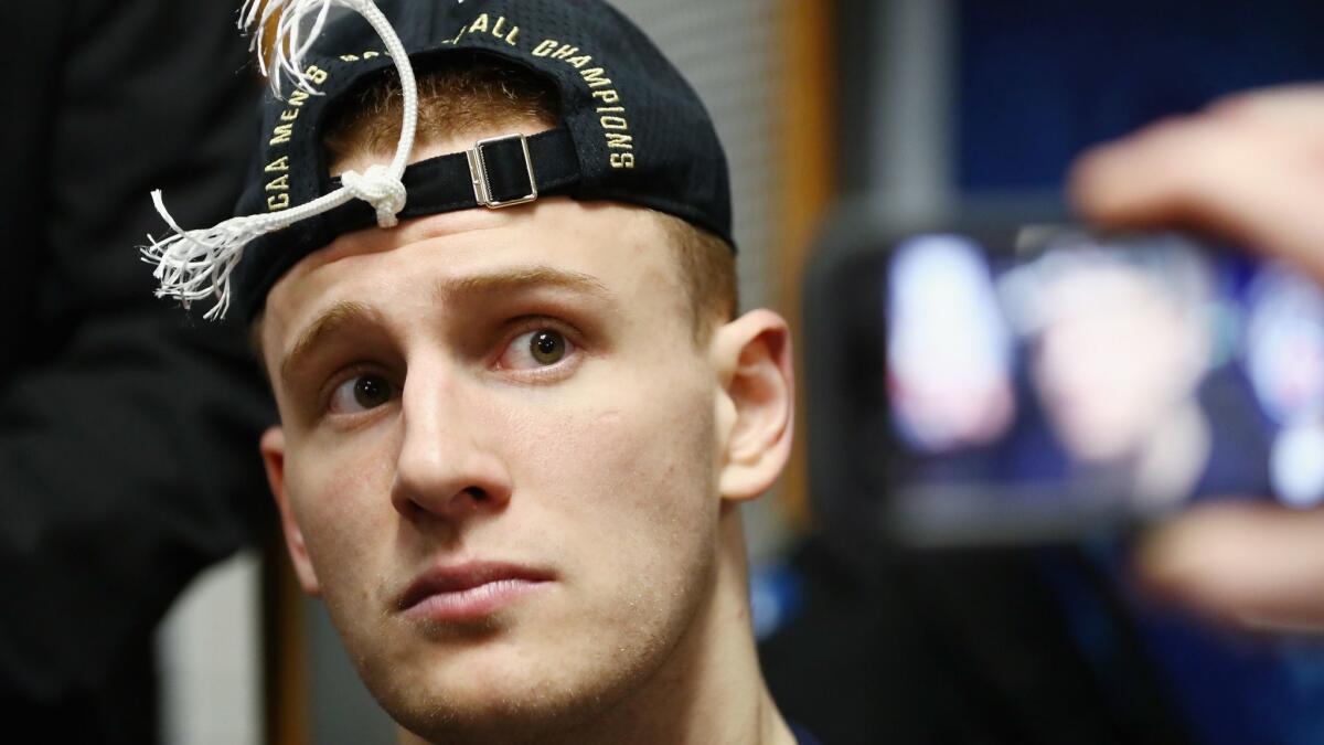 Villanova's Donte DiVincenzo talks to reporters after the Wildcats' win over Michigan in the NCAA championship game on April 2..