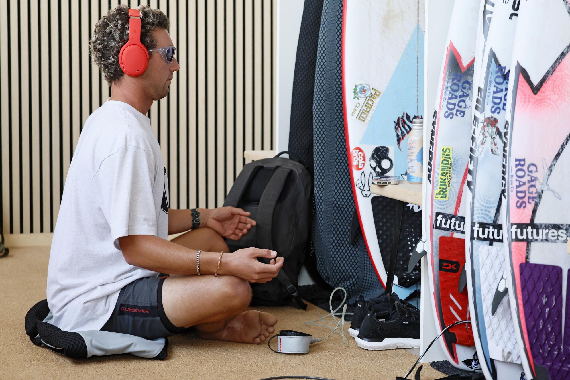 San Clemente native Griffin Colapinto meditates prior to his match with Brazilian Italo Ferreira.