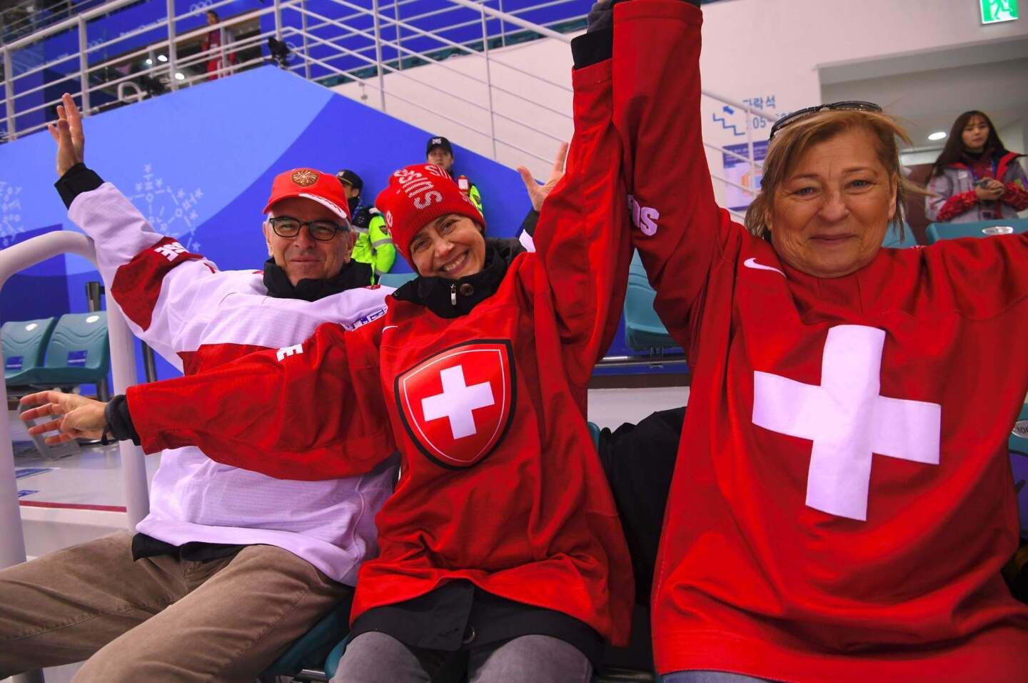 Switzerland's fans cheer in the women's quarter-final ice hockey match between the Olympic Athletes from Russia and Switzerland during the Pyeongchang 2018 Winter Olympic Games at the Kwandong Hockey Centre in Gangneung on February 17, 2018. / AFP PHOTO / Jung Yeon-jeJUNG YEON-JE/AFP/Getty Images ** OUTS - ELSENT, FPG, CM - OUTS * NM, PH, VA if sourced by CT, LA or MoD **