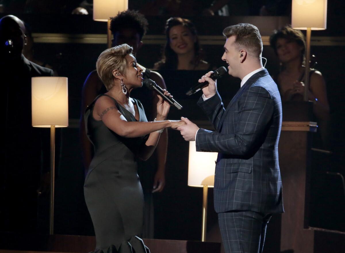 Mary J. Blige and Sam Smith perform at the 57th Annual Grammy Awards, where Smith took home three top honors.