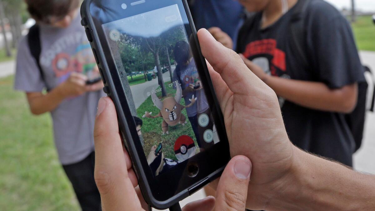 A group of "Pokemon Go" players at Bayfront Park in downtown Miami.