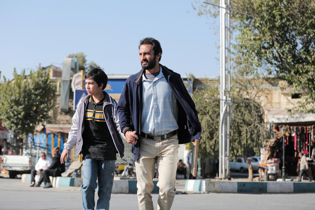 Amir Jadidi(right) and Saleh Karimai in "A Hero"