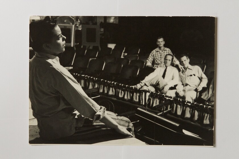 Garland performs while Luft, left, looks on with choreographer Dick Barstow.