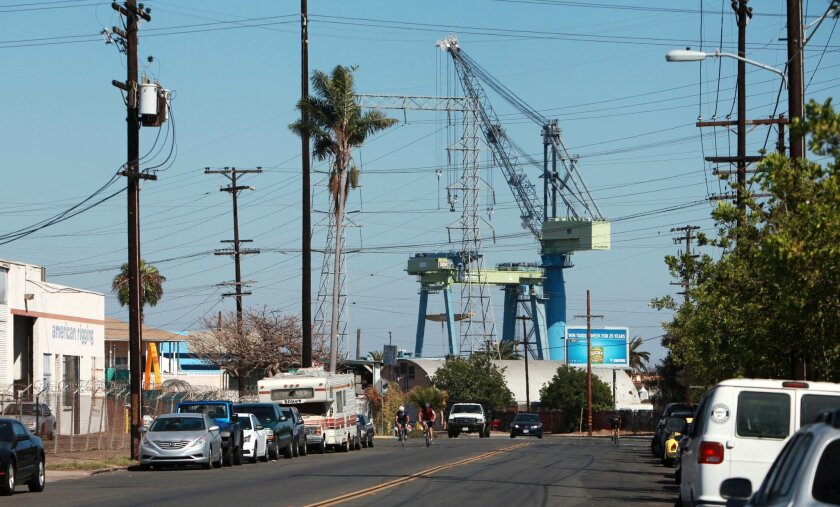 Down in the Barrio Logan area, the mix between residential homes and industrial business is evident. Controversy over the environmental impacts of these businesses is still being debated.