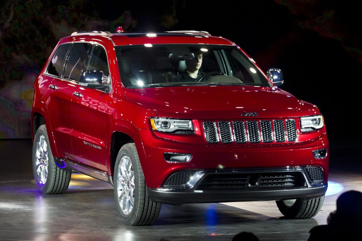 Chrysler is recalling 184,215 SUVs worldwide because a wiring problem could disable their air bags and seat belt pretensioners. The recall involves the 2014 model year Dodge Durango and Jeep Grand Cherokee shown above.