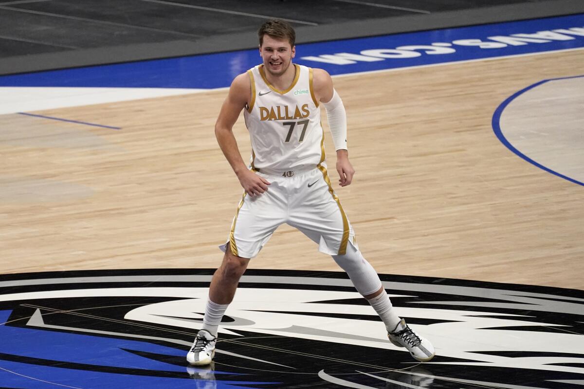 NBA: Luka Doncic leads Mavericks past Hornets in Kristaps Porzingis' return  - Los Angeles Times