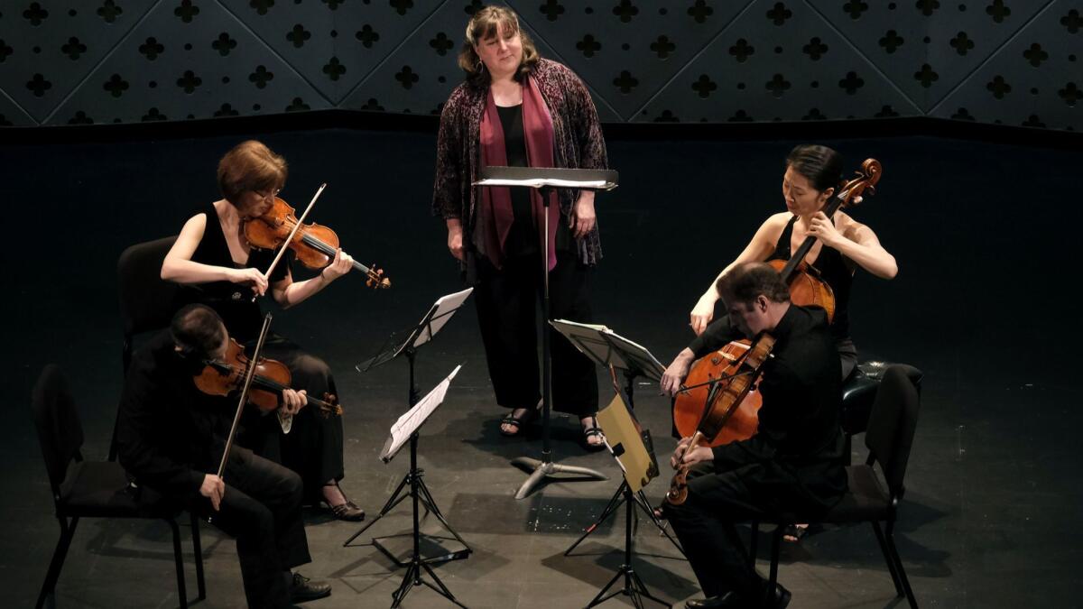 Soprano Dawn Upshaw performs with the Brentano String Quartet at Caltech's Beckman Auditorium Sunday afternoon.