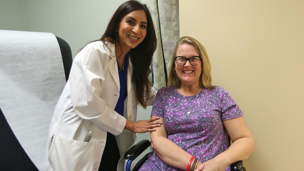 Dr. Namita Goyal, left, a UC Irvine neurologist, and patient Lisa Wittenberg are part of a nationwide study on ALS with UC Irvine.