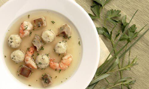 Shrimp and artichoke soup with spring herb gnocchi