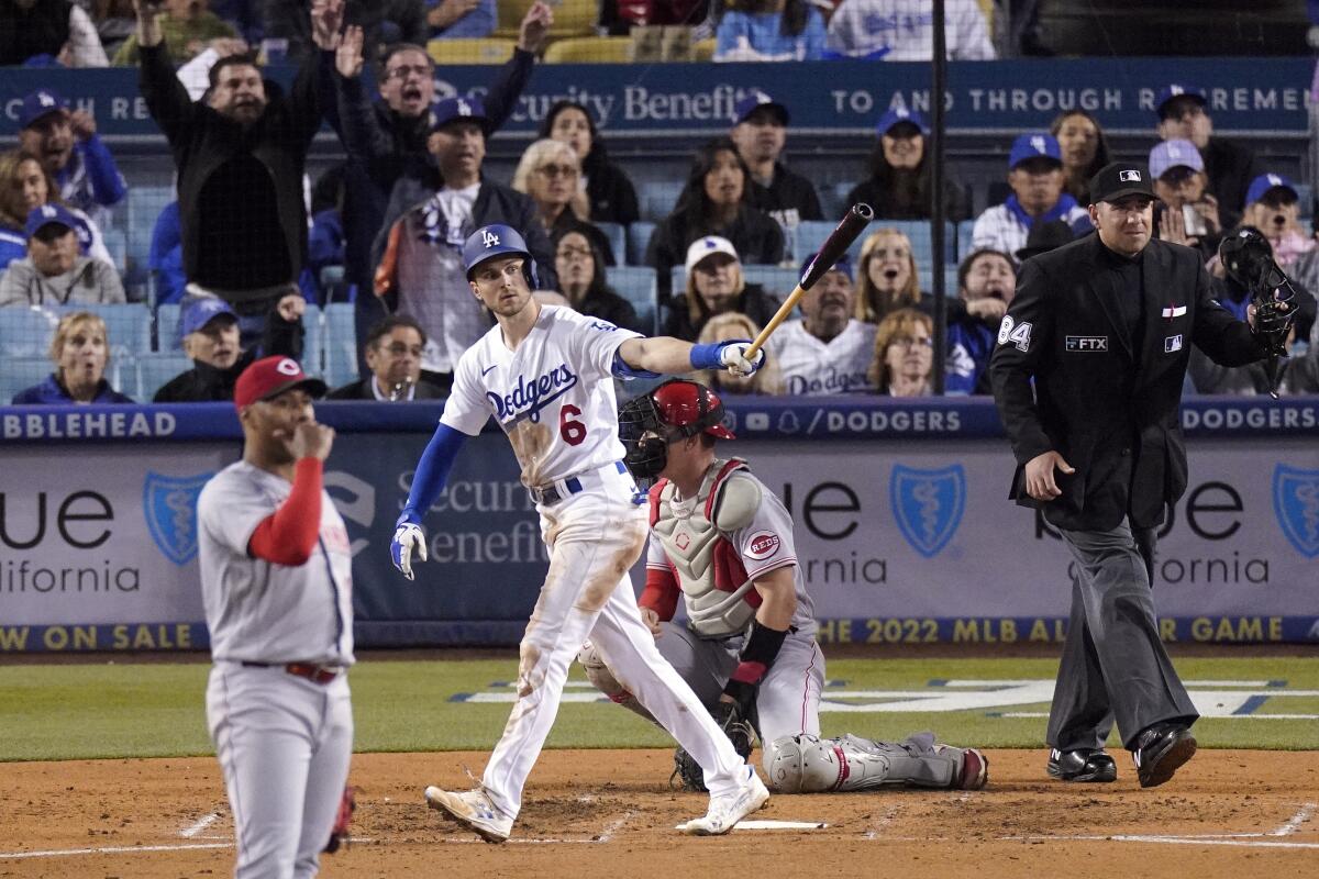 Dodgers shortstop Trea Turner hits a two-run home run off Cincinnati Reds pitcher Hunter Greene.