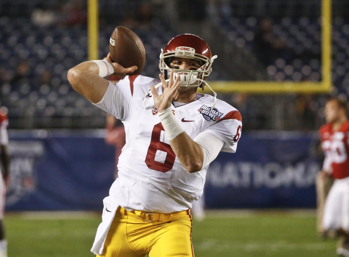USC quarterback Cody Kessler warms up for the Holiday Bowl against Wisconsin on Dec. 30.