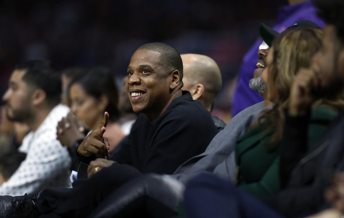 Rapper Jay Z, shown recently taking in a Los Angeles Clippers basketball game, is due to stage a voter mobilization concert in the battleground state of Ohio ahead of the Nov. 8 general election.