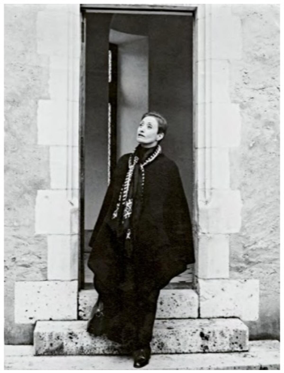 Huguette Caland in Stone Doorway, France, 1970.