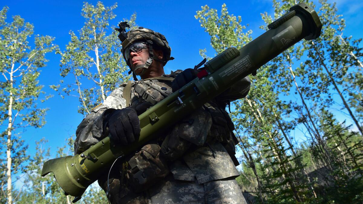 A U.S. soldier participates in a war simulation at a military training area in Alaska on July 25.