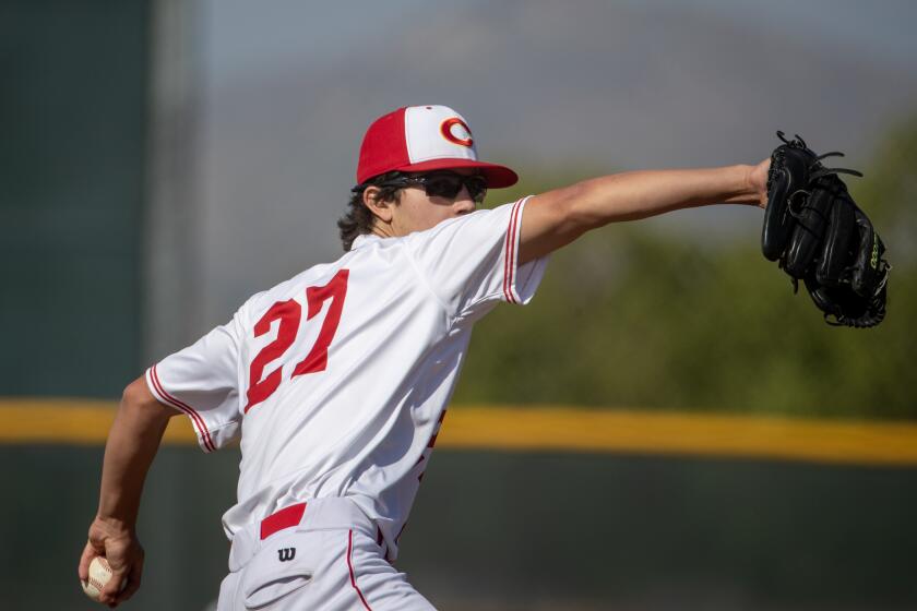 Corona, CA - May 12: Corona starting pitcher Ethan Schiefelbein delivers a pitch against Notre Dame (SO) during the Southern Section Division 1 quarterfinal game at Corona High School in Corona Friday, May 12, 2023. (Allen J. Schaben / Los Angeles Times)