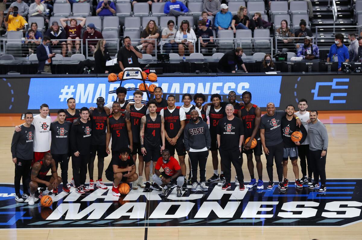 SDSU's basketball team poses for a photo at the NCAA Tourmament last March in Fort Worth, Texas.