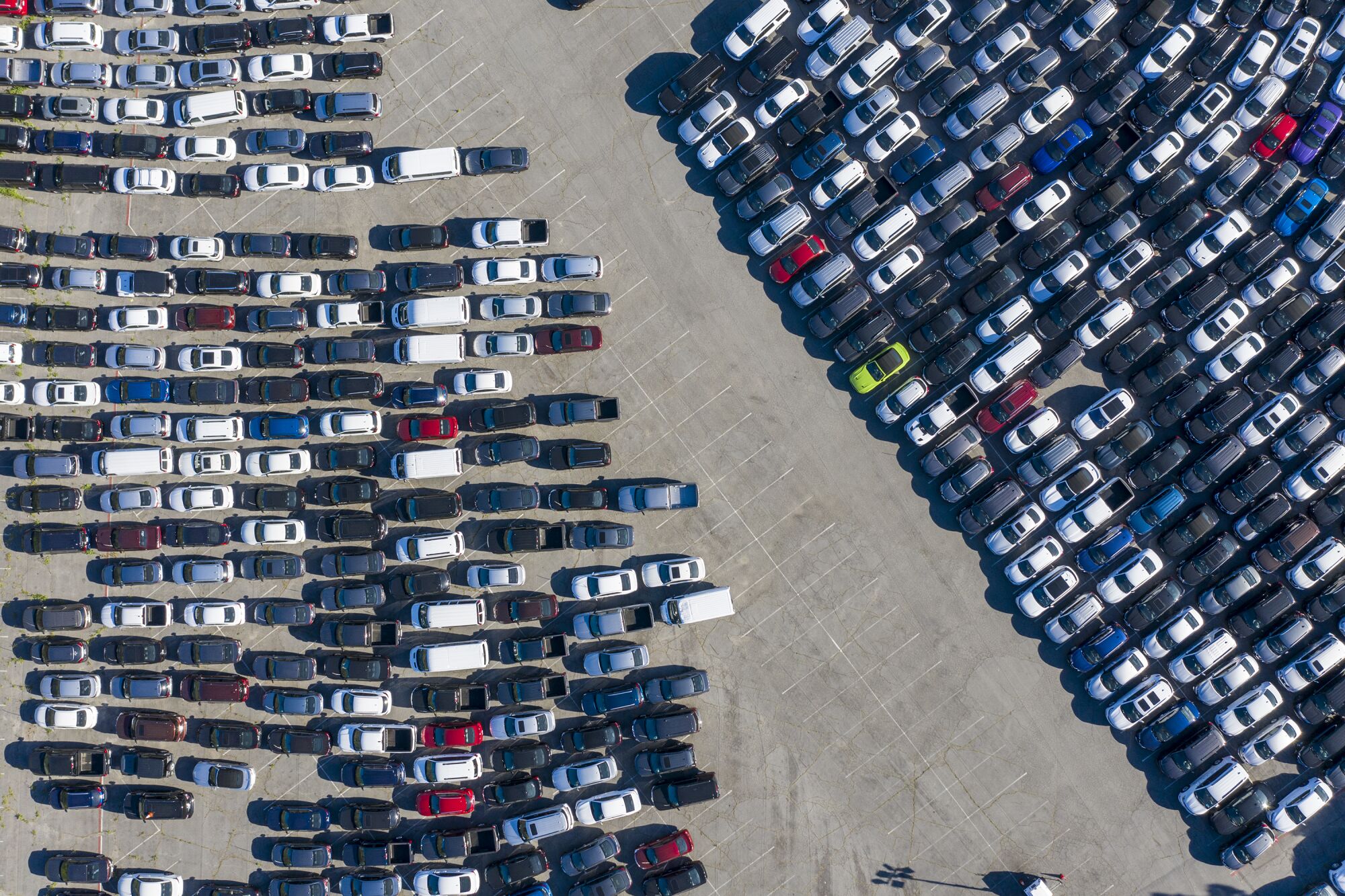 A drone takes a bird's-eye view of the cars stored at Dodger Stadium.