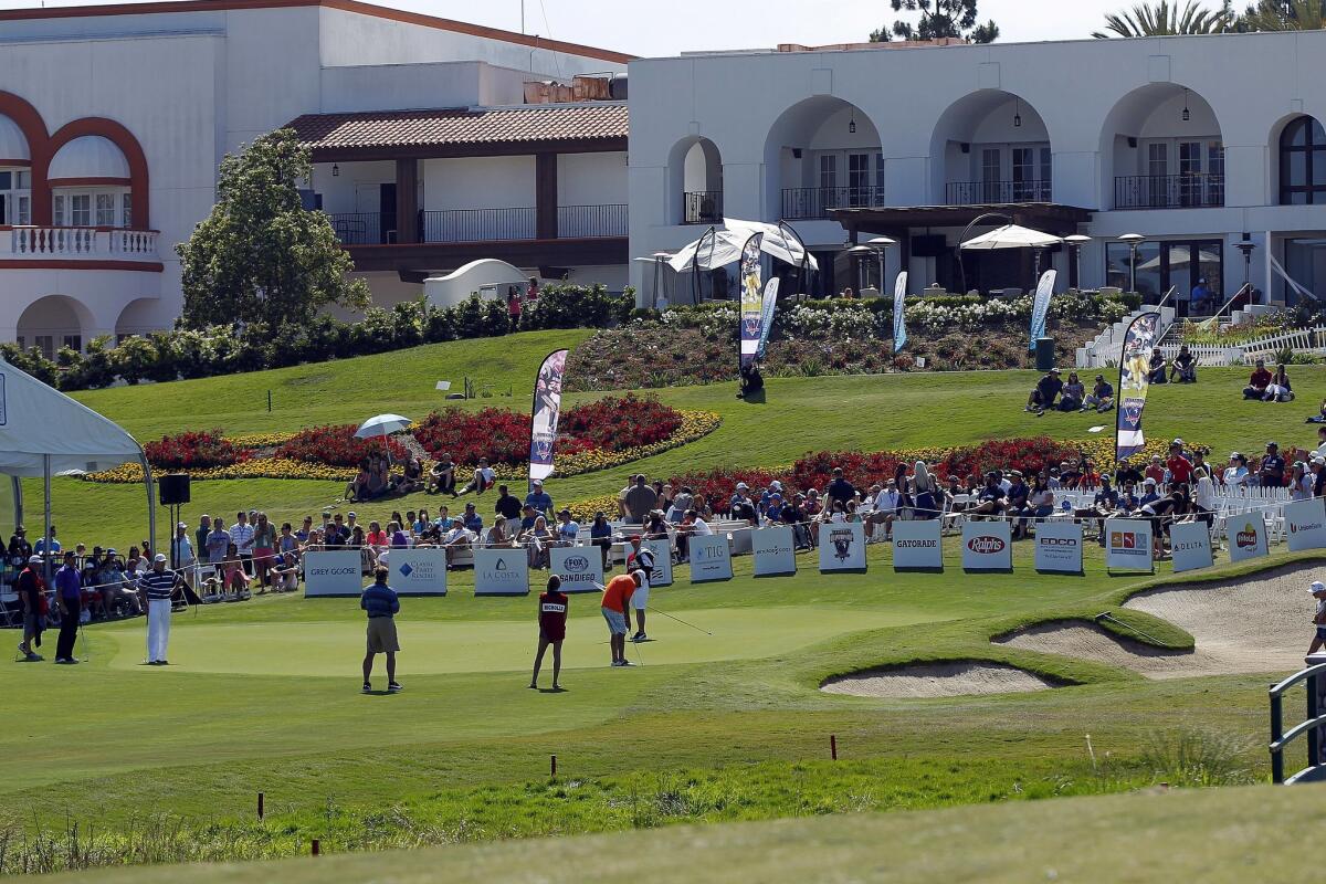 Players putt on the 18th hole during The Celebrity Championship golf tournament held the Omni La Costa Resort & Spa.