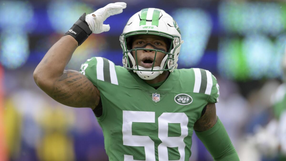 New York Jets inside linebacker Darron Lee (58) reacts during the first half against the Minnesota Vikings.
