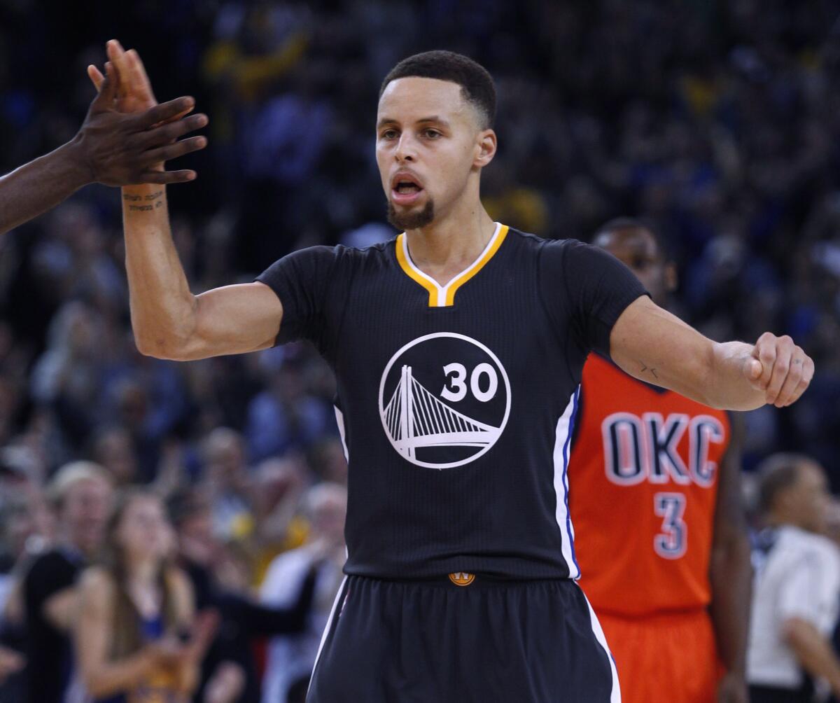 Warriors guard Stephen Curry had 26 points with 10 assists in Golden State's 116-108 victory over the Oklahoma City Thunder on Feb. 6.