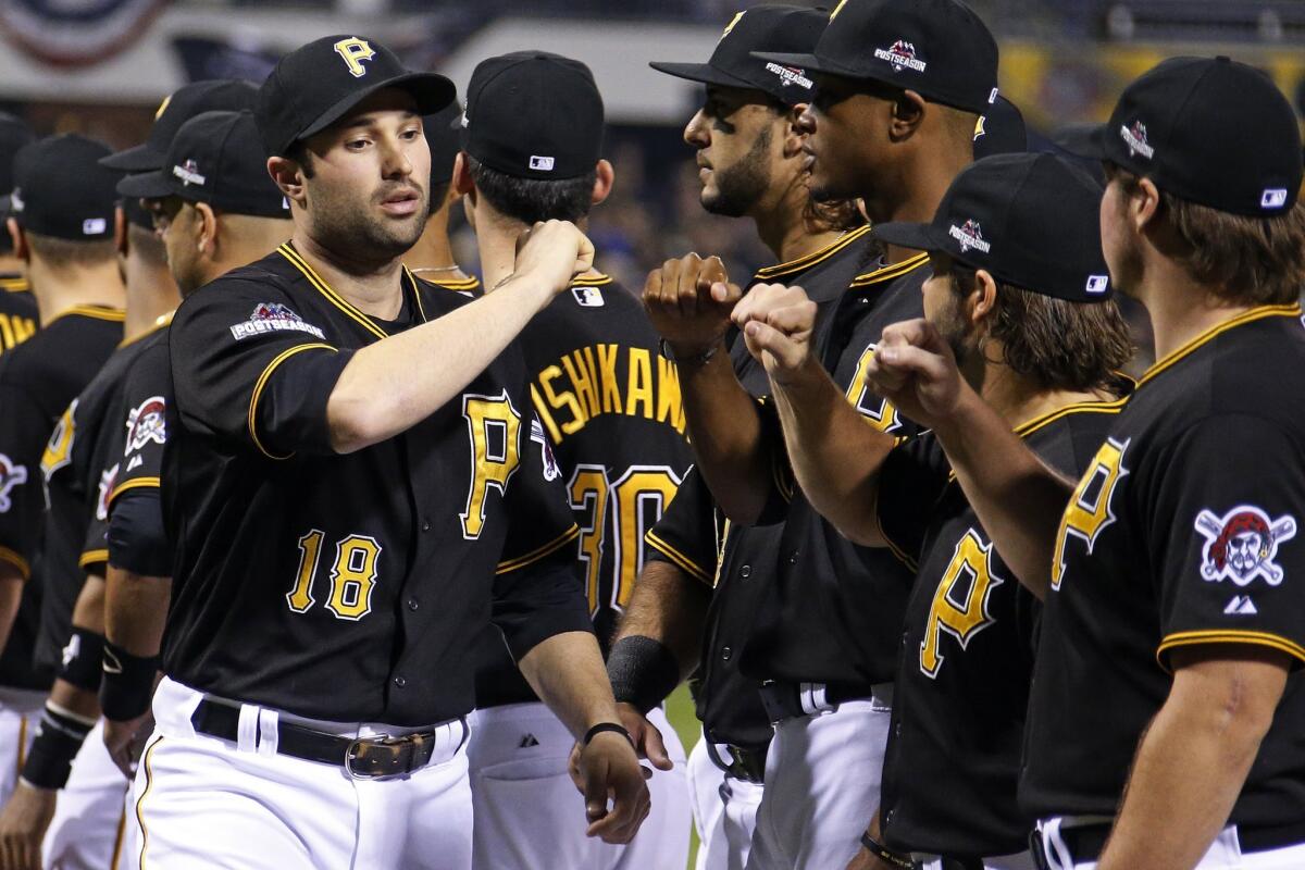 Pittsburgh's Neil Walker is introduced before the National League wild card game between the Pirates and the Chicago Cubs on Oct. 7.