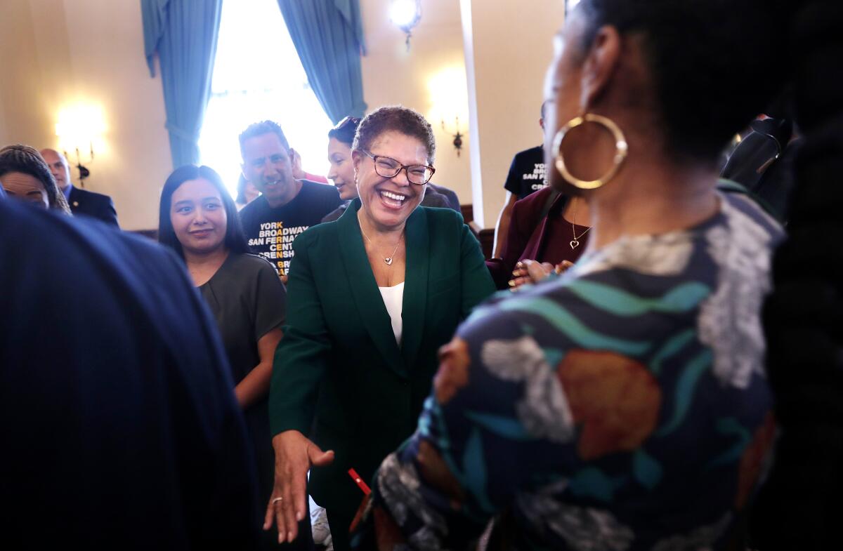 Mayor-elect Karen Bass mingles after her appearance at the Wilshire Ebell Theatre 