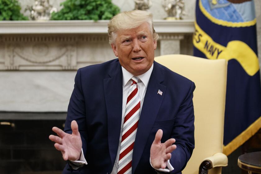 President Donald Trump speaks during a meeting with Romanian President Klaus Iohannis in the Oval Office of the White House, Tuesday, Aug. 20, 2019, in Washington. (AP Photo/Alex Brandon)