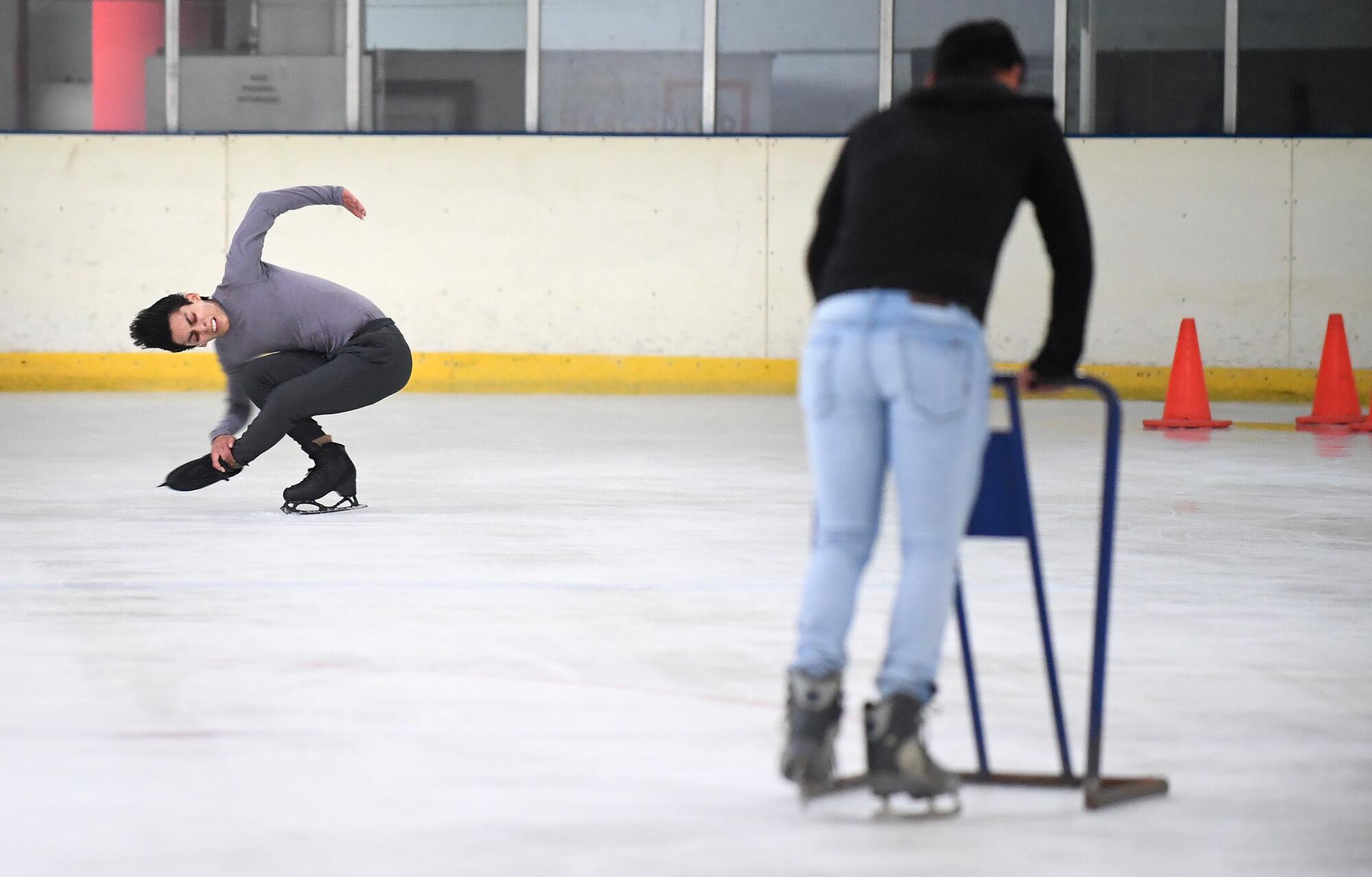Mexican figure skater Donovan Carrillo shares the ice with beginners during practice