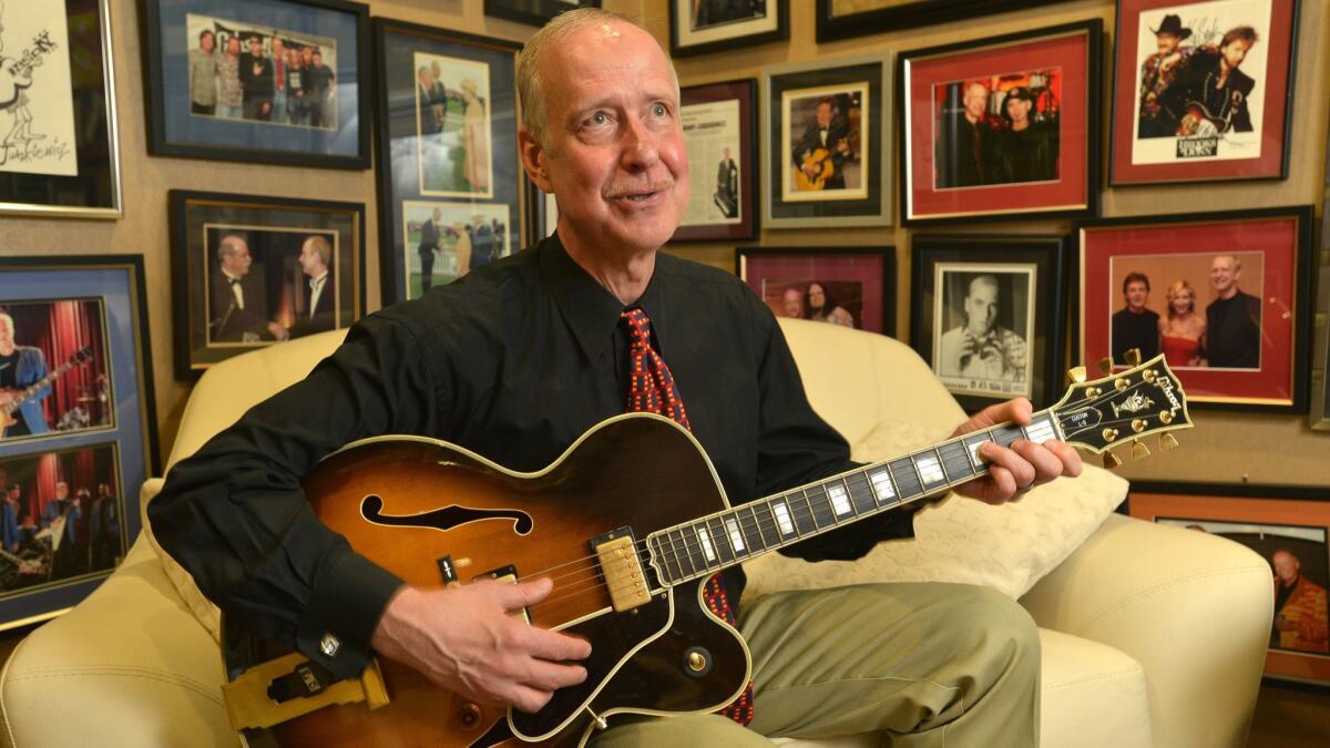 As CEO, Henry Juszkiewicz bought pieces of consumer electronics companies to turn Gibson Guitars into Gibson Brands, a "music lifestyle" company. It didn't work out as planned.