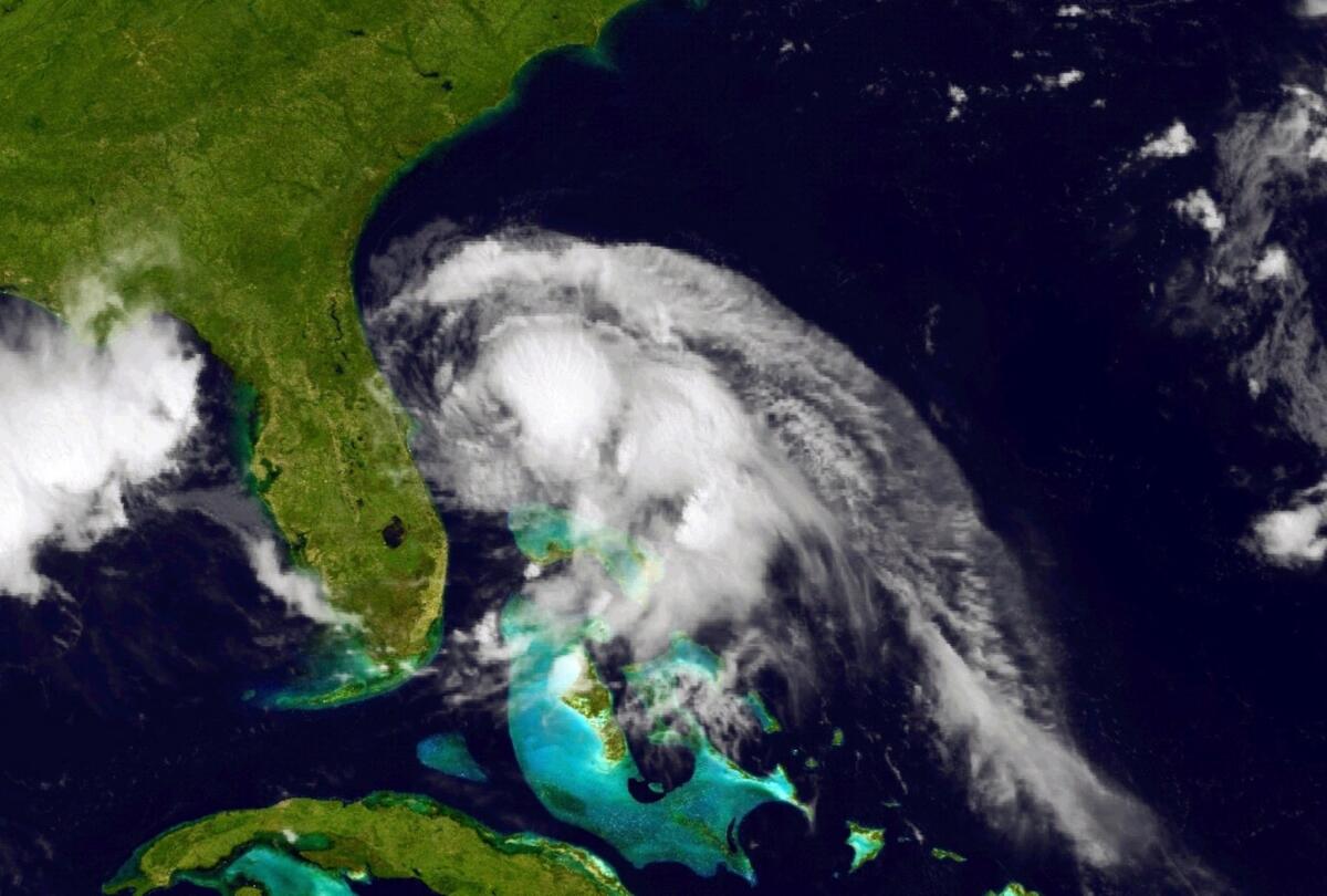 In this handout provided by the National Oceanic and Atmospheric Administration (NOAA) from the GOES-East satellite, weather system Arthur travels up the east coast of the United States in the Atlantic Ocean pictured at 17:45 UTC/GMT on July 2, 2014.