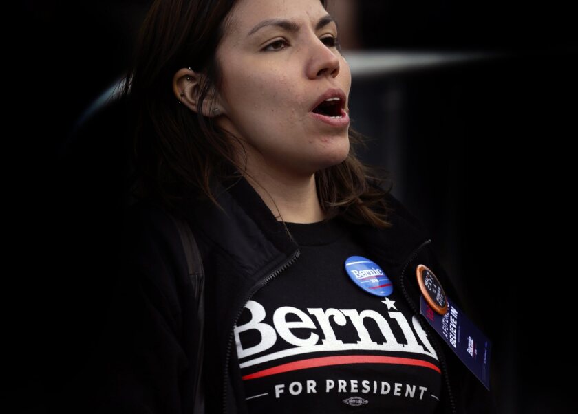 A Bernie Sanders supporter attends a campaign rally in Saint Mary's Park in the Bronx borough of New York City on March 31.