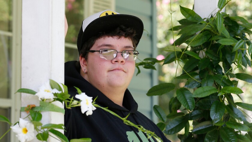 Gavin Grimm on his front porch during an interview at his home last year in Gloucester, Va.