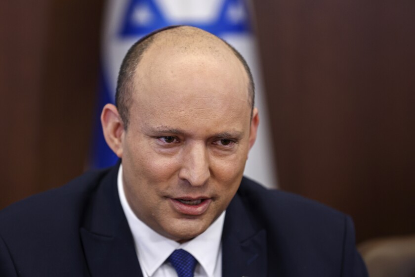 Israeli Prime Minister Naftali Bennett chairs a cabinet meeting at the prime minister's office in Jerusalem, Sunday, June 26, 2022. (Ronen Zvulun/Pool via AP)