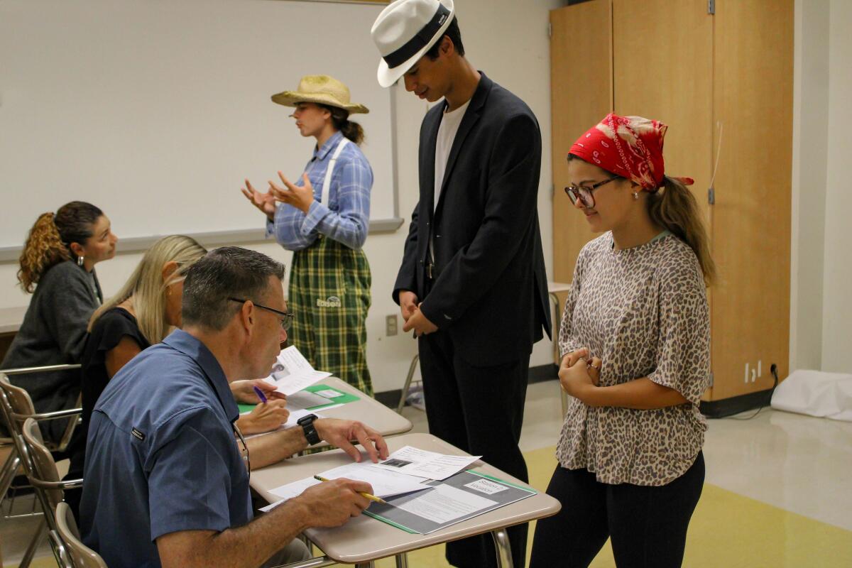 Edison High juniors partake in an Ellis Island Experience, a simulation designed to teach about the immigrant experience.