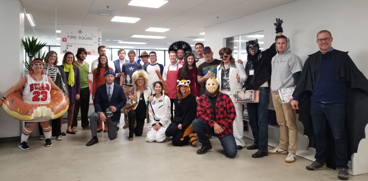 Coffman Engineers employees dress up for the 2019 Halloween party.