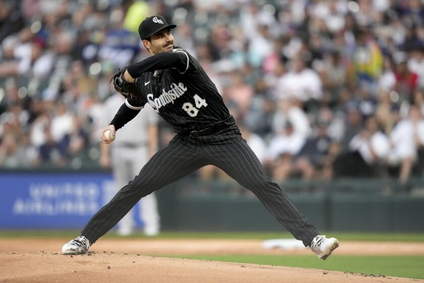 Chicago White Sox starting pitcher Dylan Cease delivers during the first inning of a baseball game against the New York Yankees Monday, Aug. 7, 2023, in Chicago. (AP Photo/Charles Rex Arbogast)