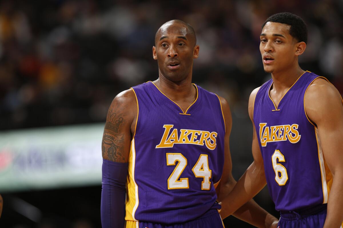 Lakers forward Kobe Bryant (24) and guard Jordan Clarkson (6) in the first half against the Denver Nuggets on March 2.