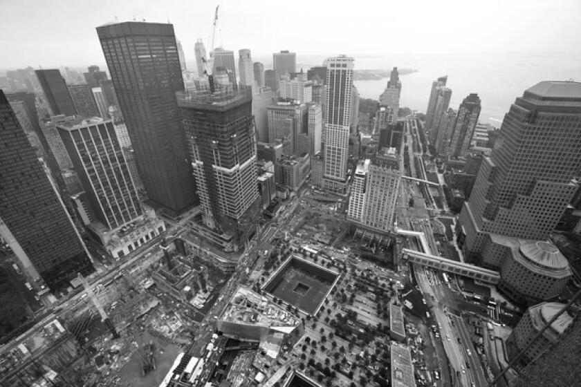 The view from the unfinished Freedom Tower that rises above the "Reflecting Absence" memorial.