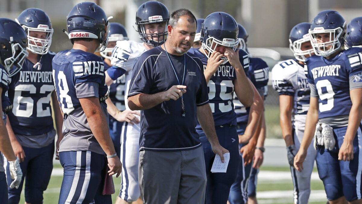 Peter Lofthouse, center, enters his first year as Newport Harbor High's football coach. He guided the San Diego Mesa College football program for three years.