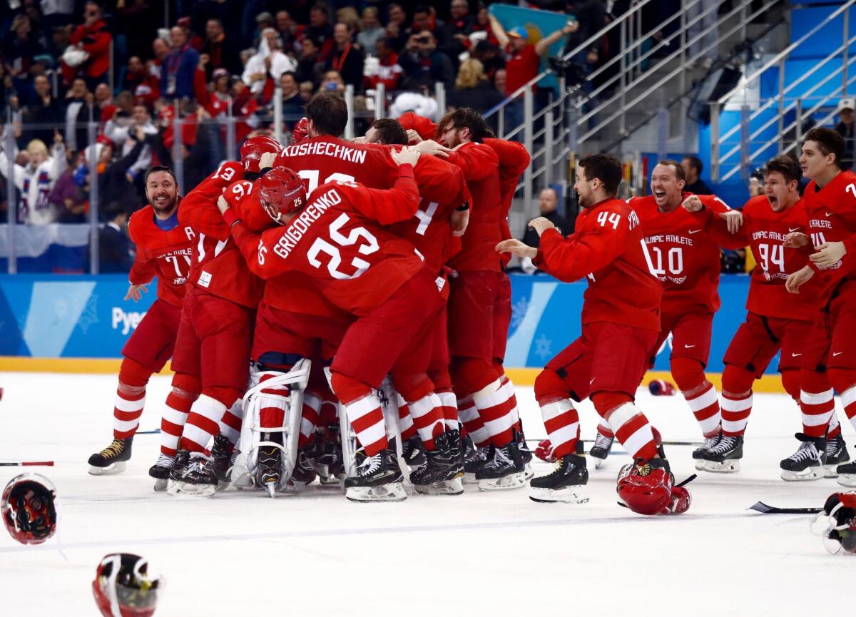 Russians celebrate the winning goal.